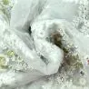 Tissus dentelle perlée fleuri blanc casée