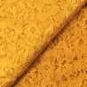 Tissu dentelle polyester stretch jaune moutarde fleuri