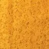 Tissu dentelle polyester stretch jaune moutarde fleuri