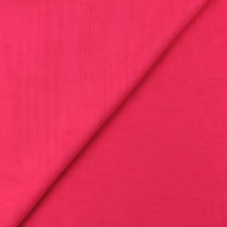 Tissu mousseline uni de couleur fuchsia fluo