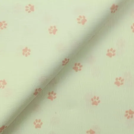 Tissu coton blanc milleraie imprimé pattes de chien rose