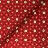 Tissu en coton motif pois et fleurs sur fond rouge