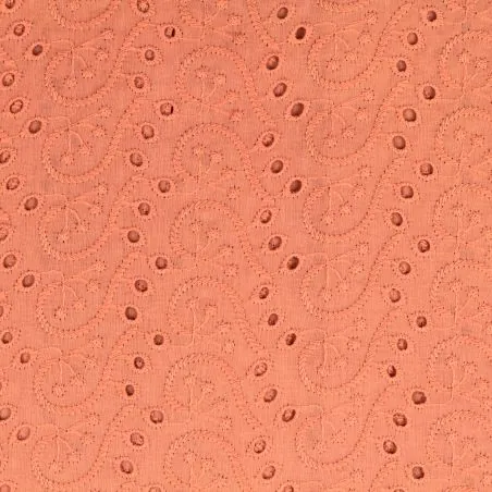 Tissu broderie anglaise rose saumon imprimé géométrique