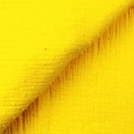 Tissu coton double gaze uni jaune imprimé plumetis