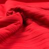 Tissu plissé polyester uni rubis