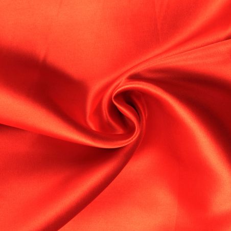 Tissus satin polyester orange perlé